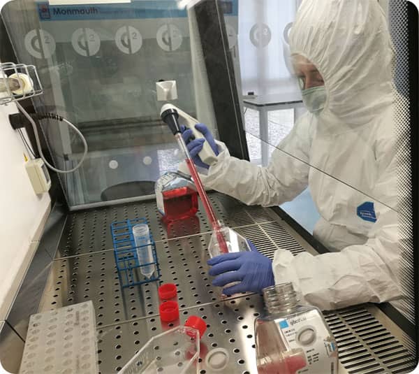 Lab assistant working with stem cells